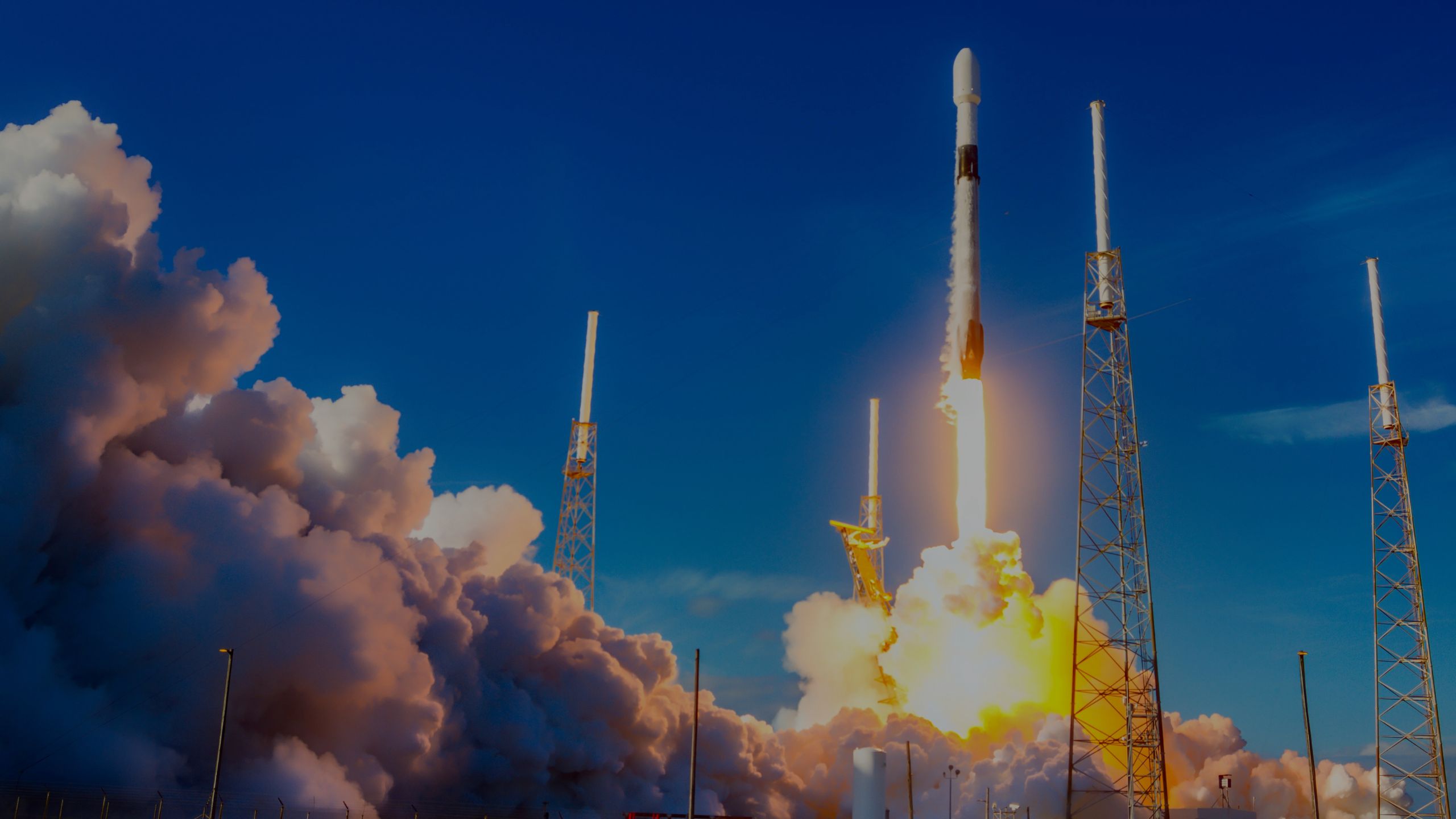 SpaceX Falcon 9 rocket lifting 60 Starlink satellites to orbit