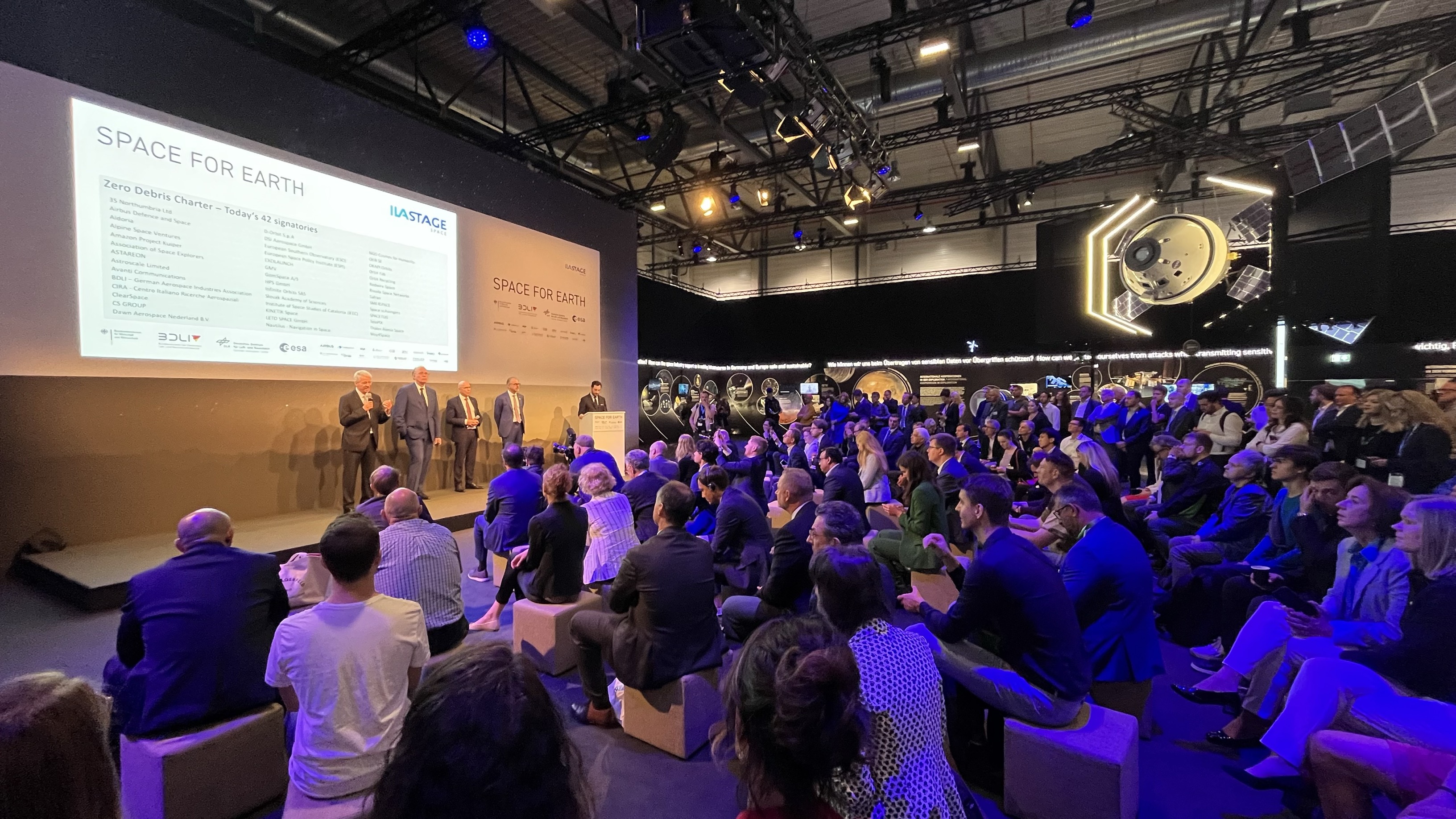 Moments from the Zero Debris Charter signing ceremony at ILA 2024