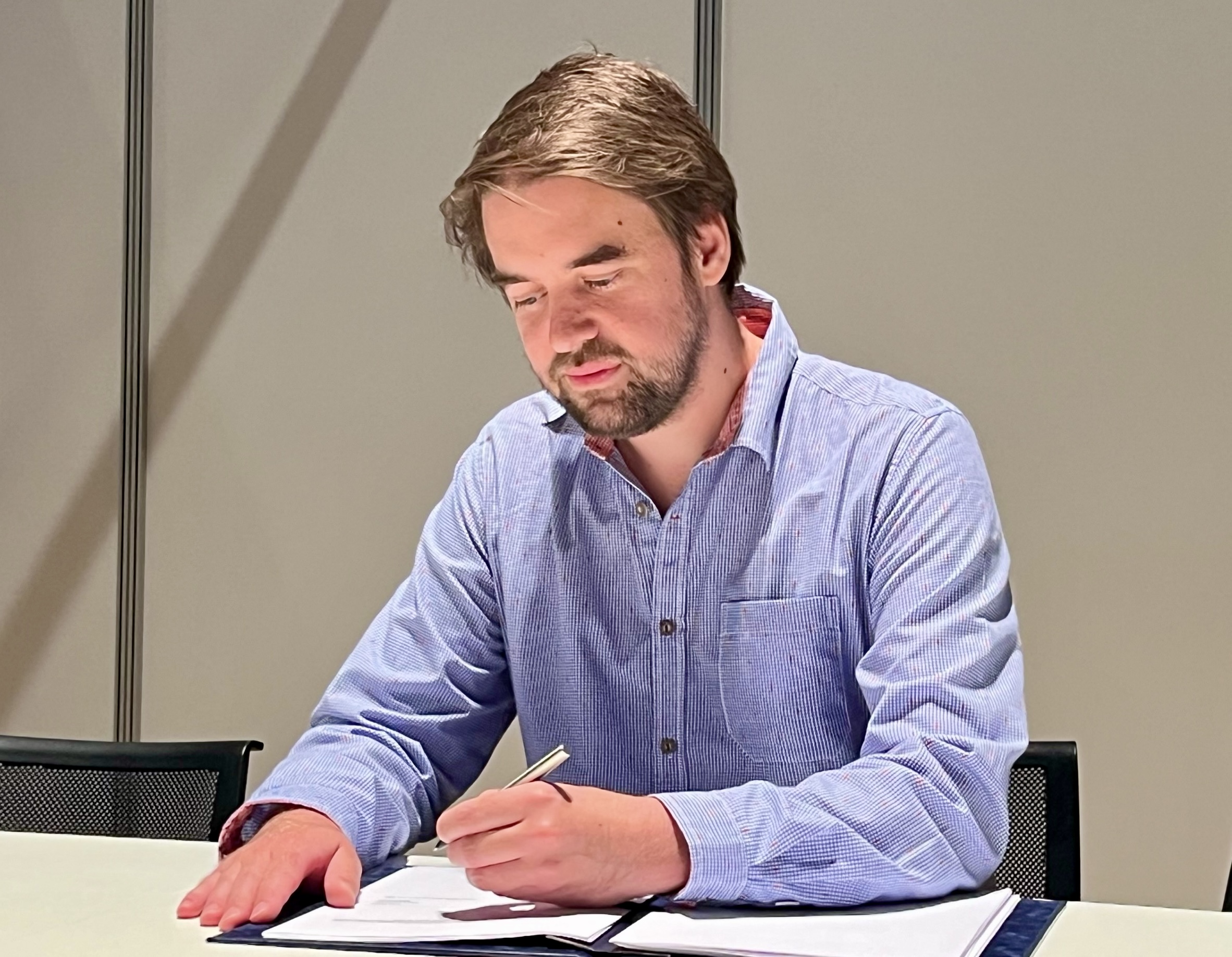 Jonas Radtke, Co-Founder of OKAPI:Orbits, signing the Zero Debris Charter